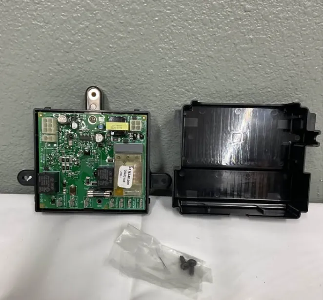 Technician repairing a Dometic RV refrigerator control board